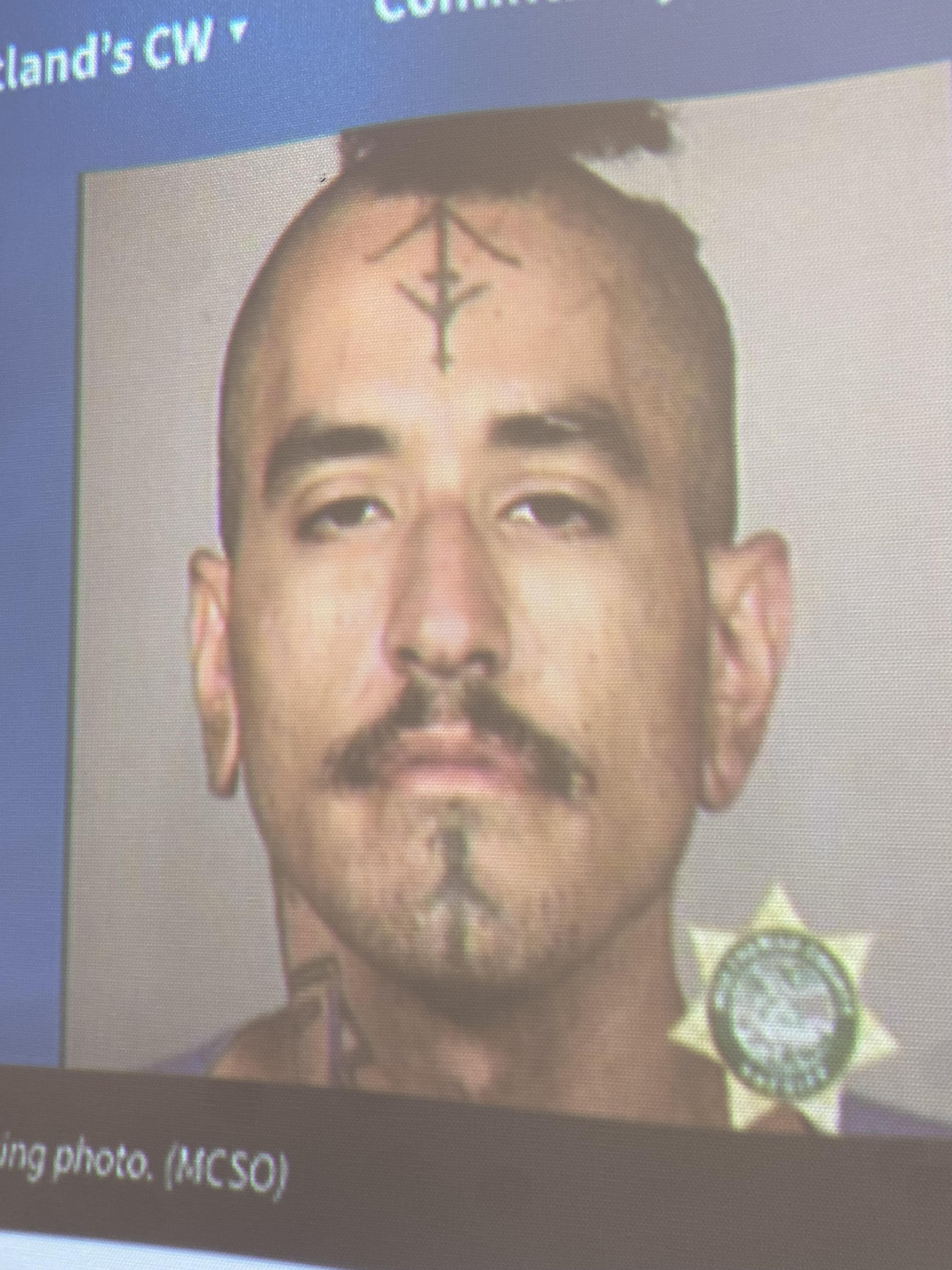 Does anyone know what this guy's tattoo means? I saw his court ...